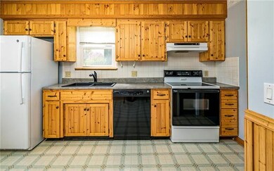 Custom Cabinets. Great Running Fridge stays with h