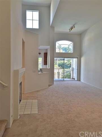 Two-Story Ceilings w/ Loft Overlooking Great Room.