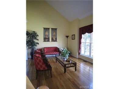Vaulted ceiling in formal living room with beautif