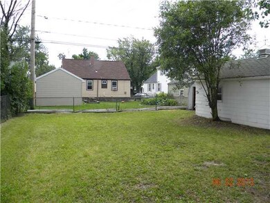 Yard/Garden. The back yard. There is an open shed 