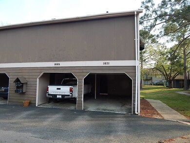NICE 1 CAR CARPORT COMES W/HOME