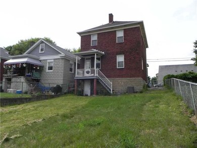 Exterior Back. Level Fenced in yard/Access from Po