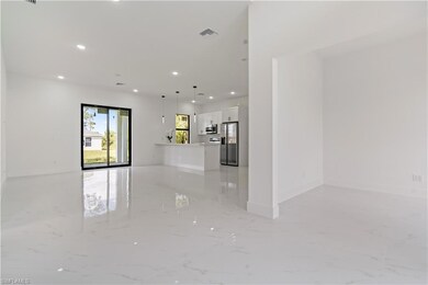 3314 8th St W, Lehigh Acres, FL 33971 - photo 2