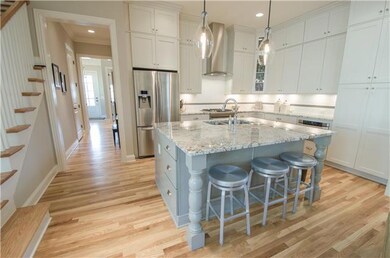 Yes, please! This Kitchen is a SHOWSTOPPER!! Pinterest & Houzz worthy! Stacked to ceiling painted cream cabinets, custom designed painted huge island, absolutely stunning granite, stainless appliances. 