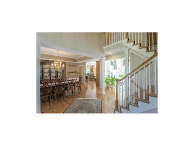 Beautiful new Hardwoods! View from Front Entry Way into Formal Dining, Great Room & Kitchen