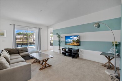 Living Room with sliders to pool
