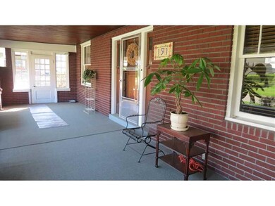 Exterior Front. This front porch extends a most wa