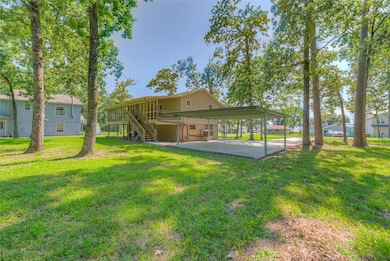 Showing spacious back yard and car port for 2 cars