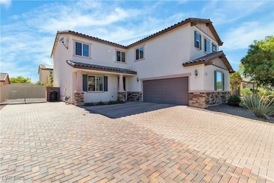 Mediterranean / spanish-style house featuring ston