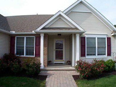 Exterior Front Nicely landscaped, with paver patio