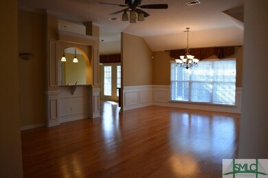 View of the living room and dining room.  Looking 