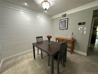 Shiplap accent wall in dining room