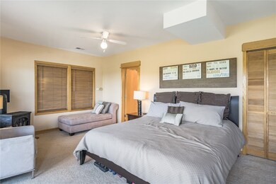 Primary bedroom suite is on the lower floor creati