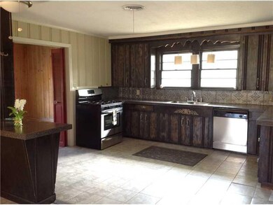 Kitchen. The updated kitchen features stainless ap