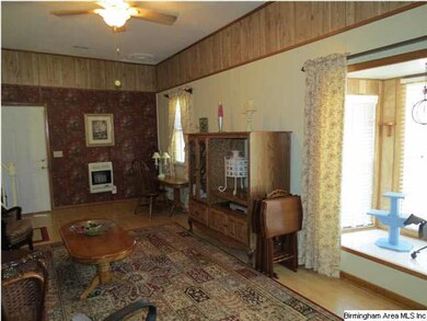 Large den with closet space, bay window and privat