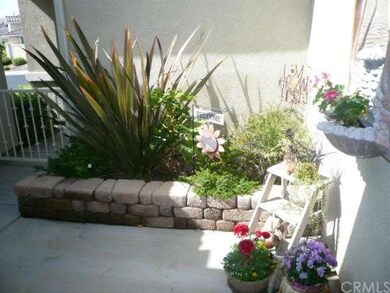 Lush courtyard entry.