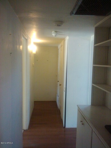 Hallway to the 3 bedrooms