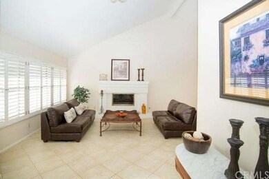 A view of the living room and fireplace