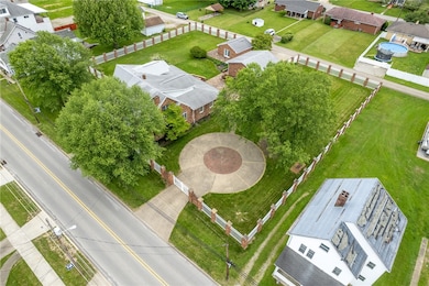 Aerial view highlights the expansive, level, fully