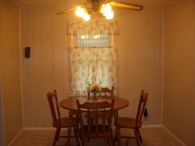Dining area is right off kitchen.