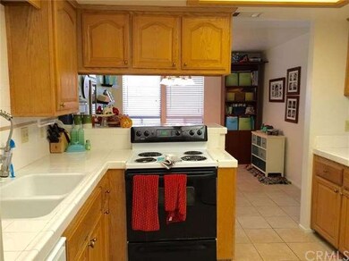 Tiled counters and the tiled flooring provides eas