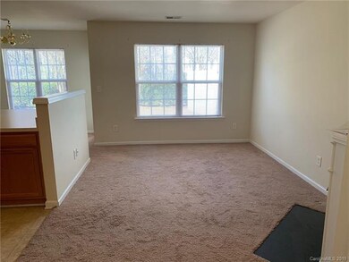 Bright family room with gas log fireplace!