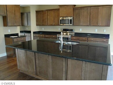 Kitchen - Closer view of oversized granite island 
