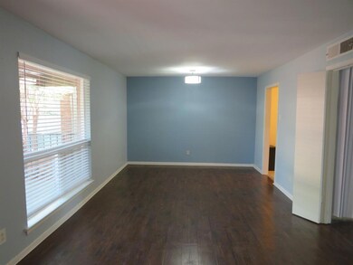 Dining room is combined with living room.