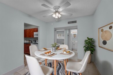 Dining room with access to kitchen and living room