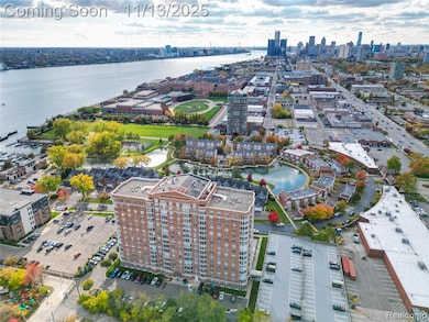 View of urban area with a nearby body of water and apartment complex