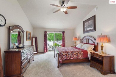 Vaulted ceilings w/fan, new carpet, and slider to 