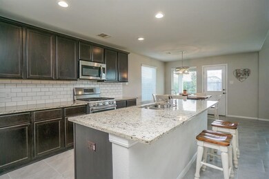 Kitchen with stainless steel appliances