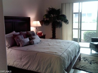 Bedroom featuring multiple windows