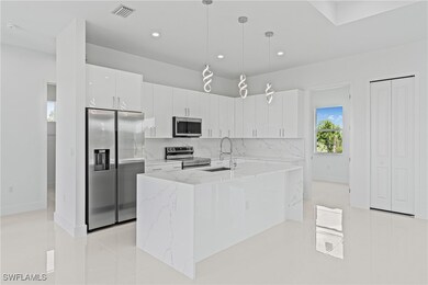 Kitchen with stainless steel appliances, recessed