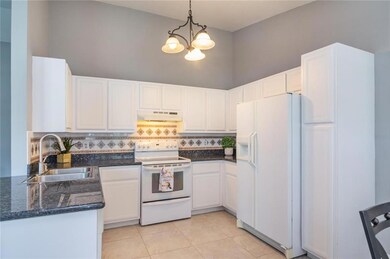 Updated granite kitchen with ample Pantry.  (No mi