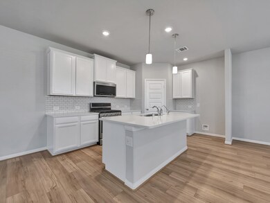 Photo is not of the actual home, but is an inspirational photo of builder’s model home and may depict options, furnishings, and/or decorator features that are not included