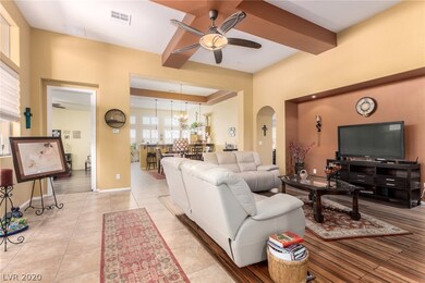 Spacious living room with tile and bamboo flooring