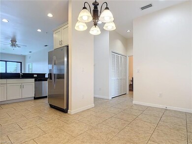 Kitchen featuring baseboards, visible vents, reces