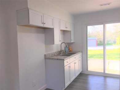 Double Doors leading to large backyard.