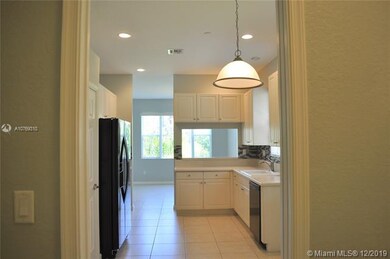 Look at the light and bright kitchen!  Lots of cab