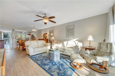 Living room area, looking towards front entry. Vie