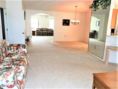 Living room and formal dining towards bonus room