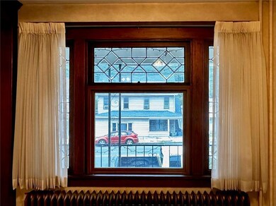 Beautiful leaded glass window with Craftsman moldi