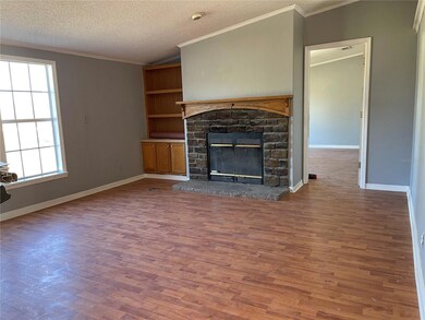 Living Room with Wood Burning Fire Place 14 X 20