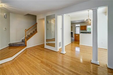 Front living room looking into dining room and kit