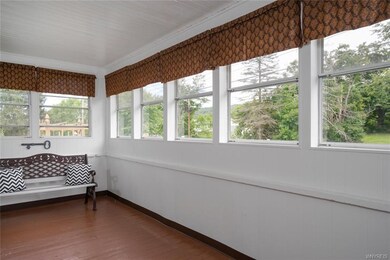 You'll love this dynamite front porch, surrounded 