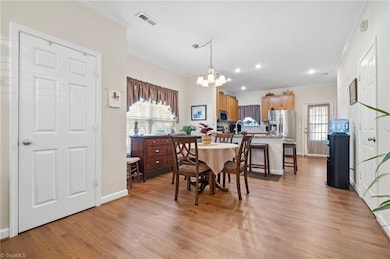 Open Floorplan to dining area and kitchen.