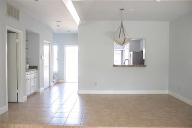 Unfurnished dining area with baseboards, visible 