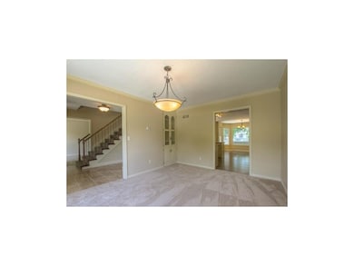 Large Formal Dining Room with new carpet, paint, f