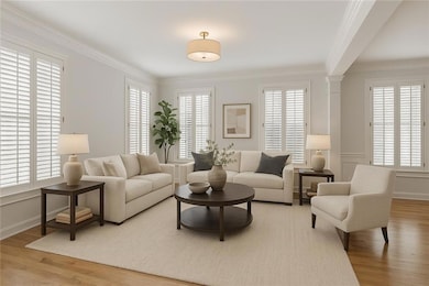 Virtually staged Living room with wood finished fl